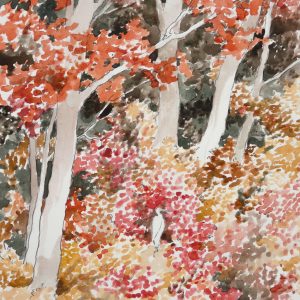 An Egret Perched Among Red and Gold Leaves